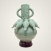 Unique green speckled ceramic vase with birds