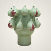 Light green ceramic vase with fig detailing